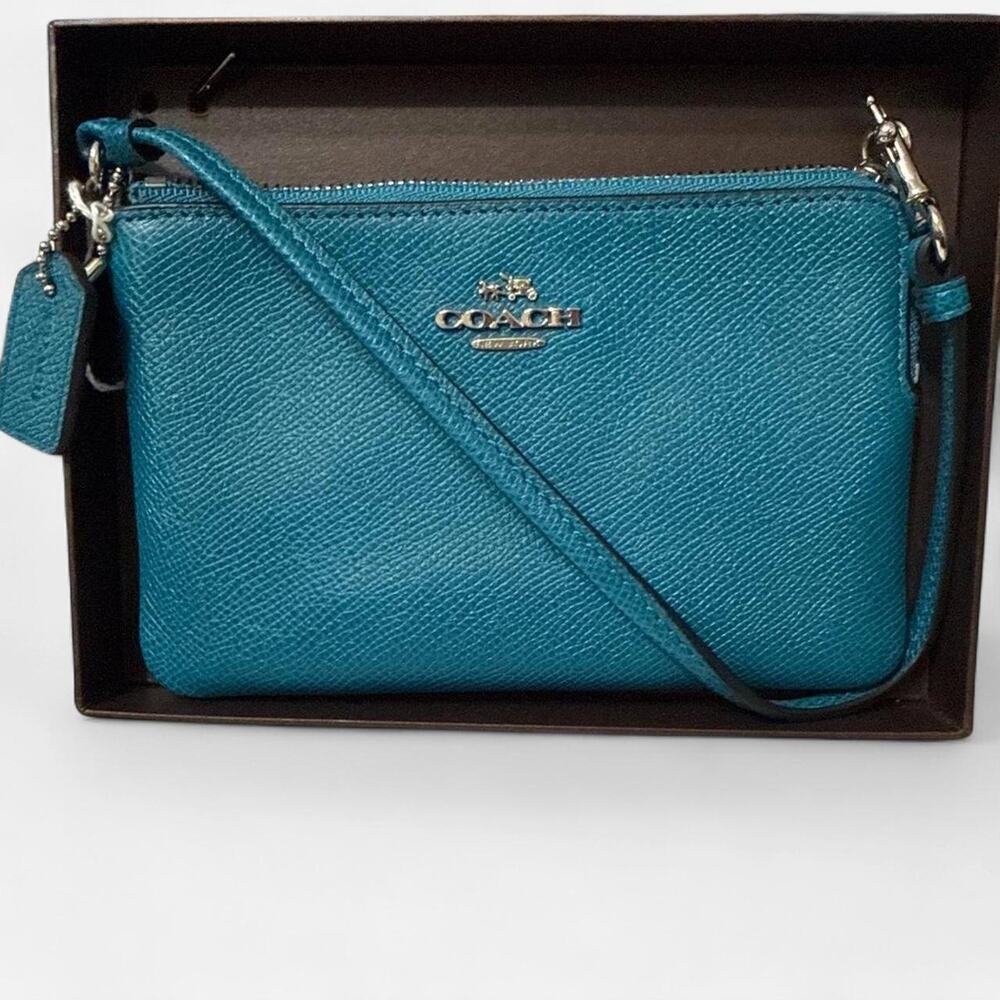 Coach teal leather corner zip